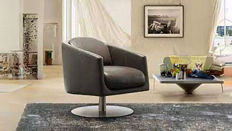 Natuzzi swivel deals chair