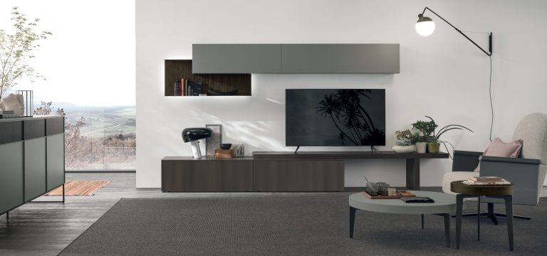 Modern living room with sleek furniture and wall-mounted TV