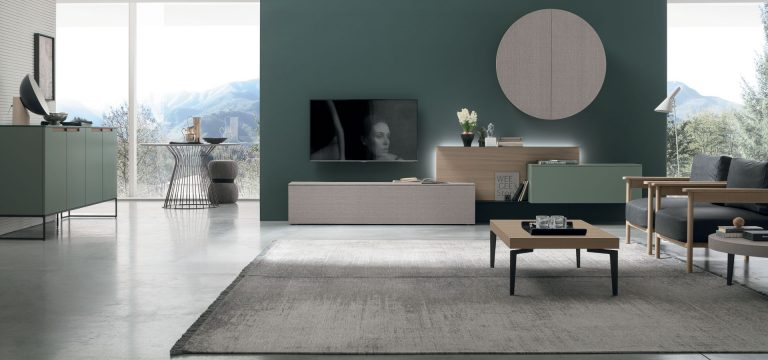 Modern living room with elegant furniture and wall decor.